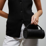 Round 90's black leather bag