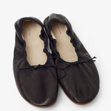 Round black ballet flats