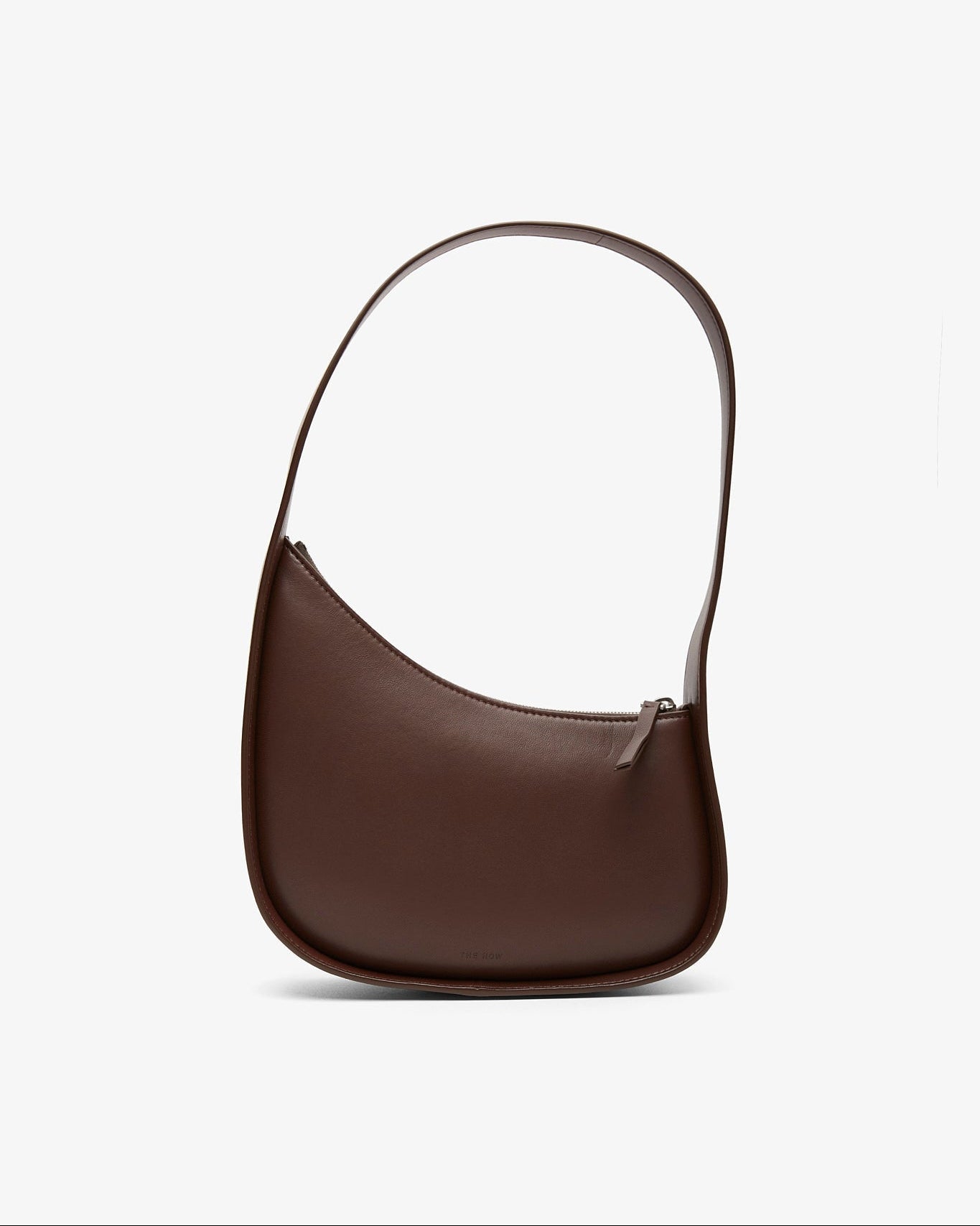 Brown leather handbag on a white background