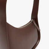 Half moon brown leather bag