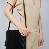 Nan black leather messenger bag