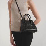 Mina 20 vienne circulaire black leather tote bag