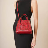 Mina 20 circulaire red tote bag