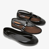 Black rubber ballet flats