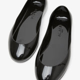 Black rubber ballet flats