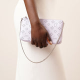 Loubila lilac patent pouch