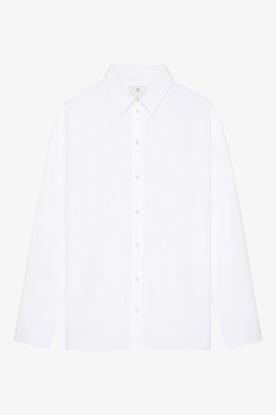 Oversized white shirt in poplin with open back