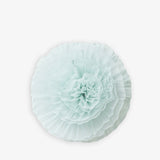 Light blue decorative item on a white background