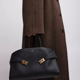 Hug black medium top handle bag
