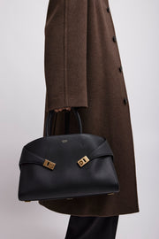 Hug black medium top handle bag