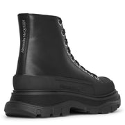 Tread slick high-top black leather boots